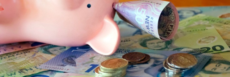 A piggy bank with cash. Representing cashflow.